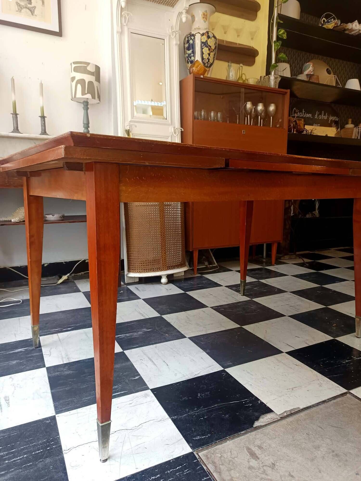 Mid-century vintage coffee table with tapered legs.