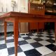 Mid-century vintage coffee table with tapered legs.