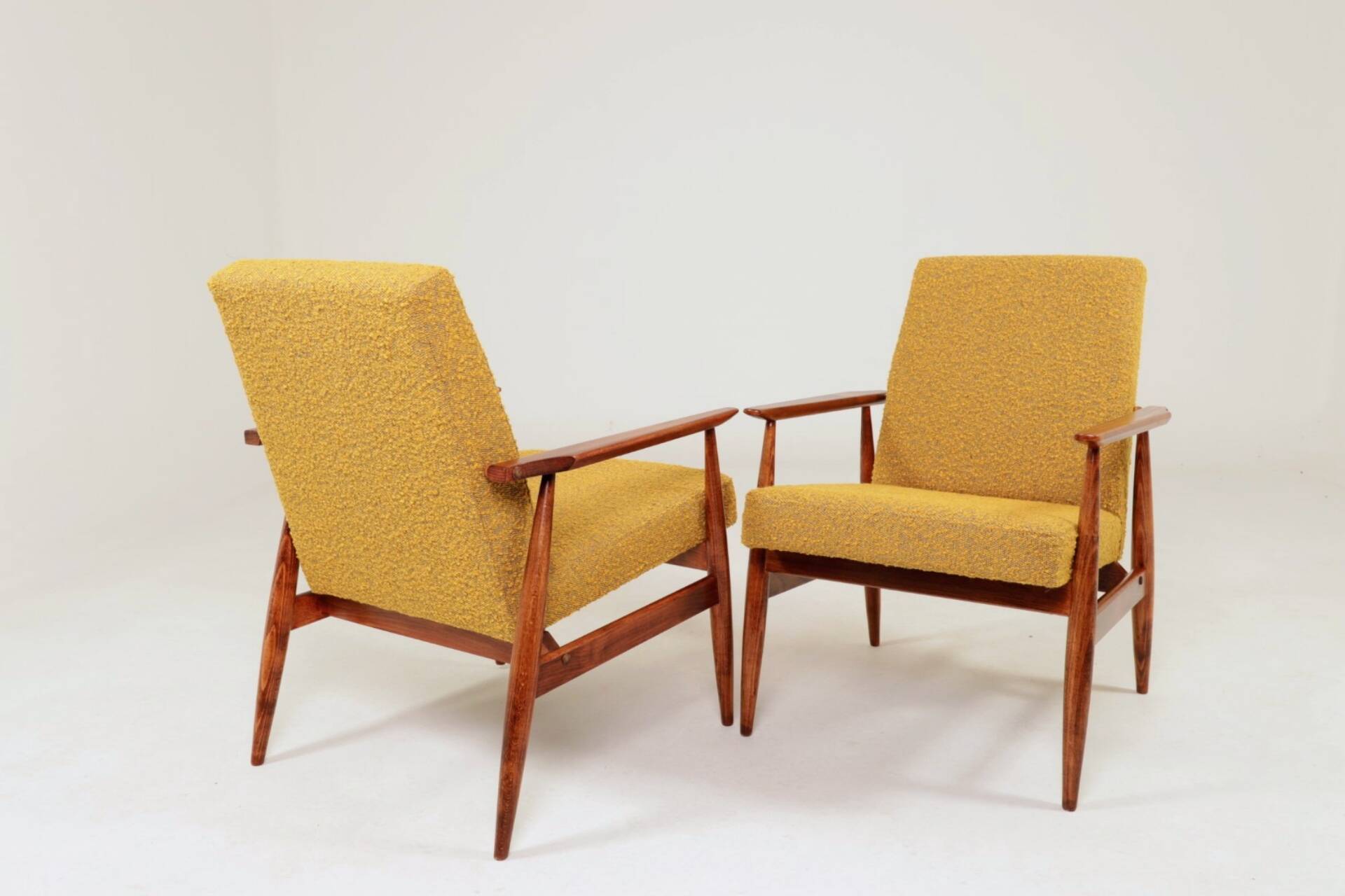 Pair of vintage boucle mustard armchairs H.Lis