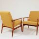 Pair of vintage boucle mustard armchairs H.Lis
