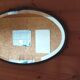 Oval beveled mirror with bronze frame - 19th century