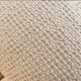 Light beige embossed cushion