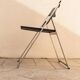 Chaise pliante Tecno P08 par Justus Kolberg - Cadre en acier, siège en plastique noir, fabriquée en Italie, années 1990.