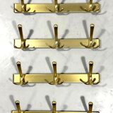 Gold coloured aluminium wall coat racks 1960’s