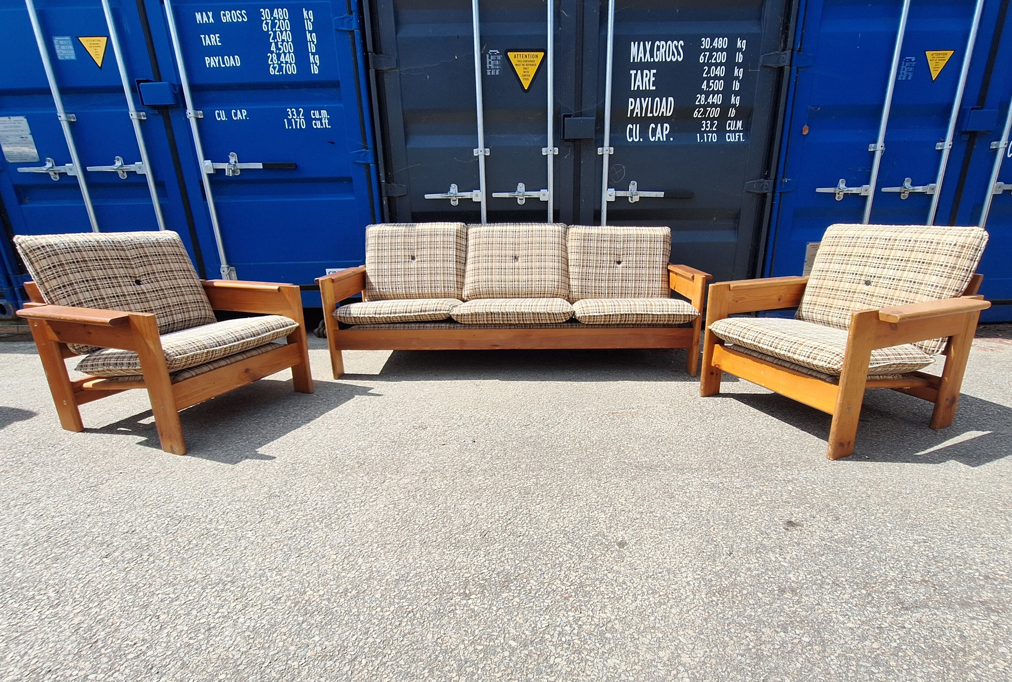 Brutalist-style bench and armchairs in 1970s pine.