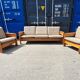 Brutalist-style bench and armchairs in 1970s pine.