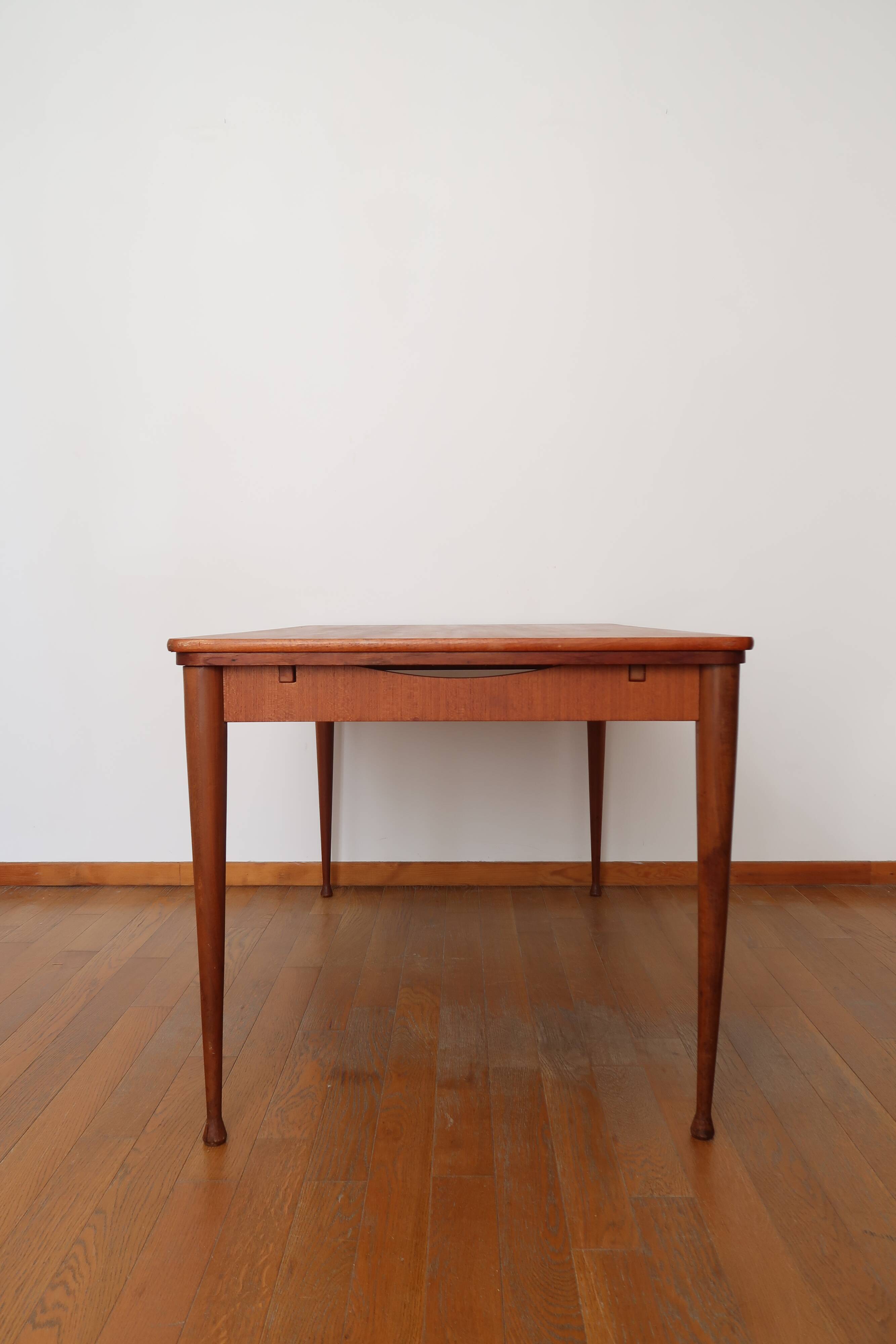 Scandinavian stretch teak table