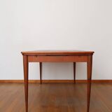 Scandinavian stretch teak table