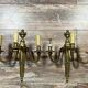 Pair of Louis XVI style gilt bronze wall lights with two light arms, 20th century