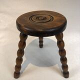 Dark turned wood tripod stool
