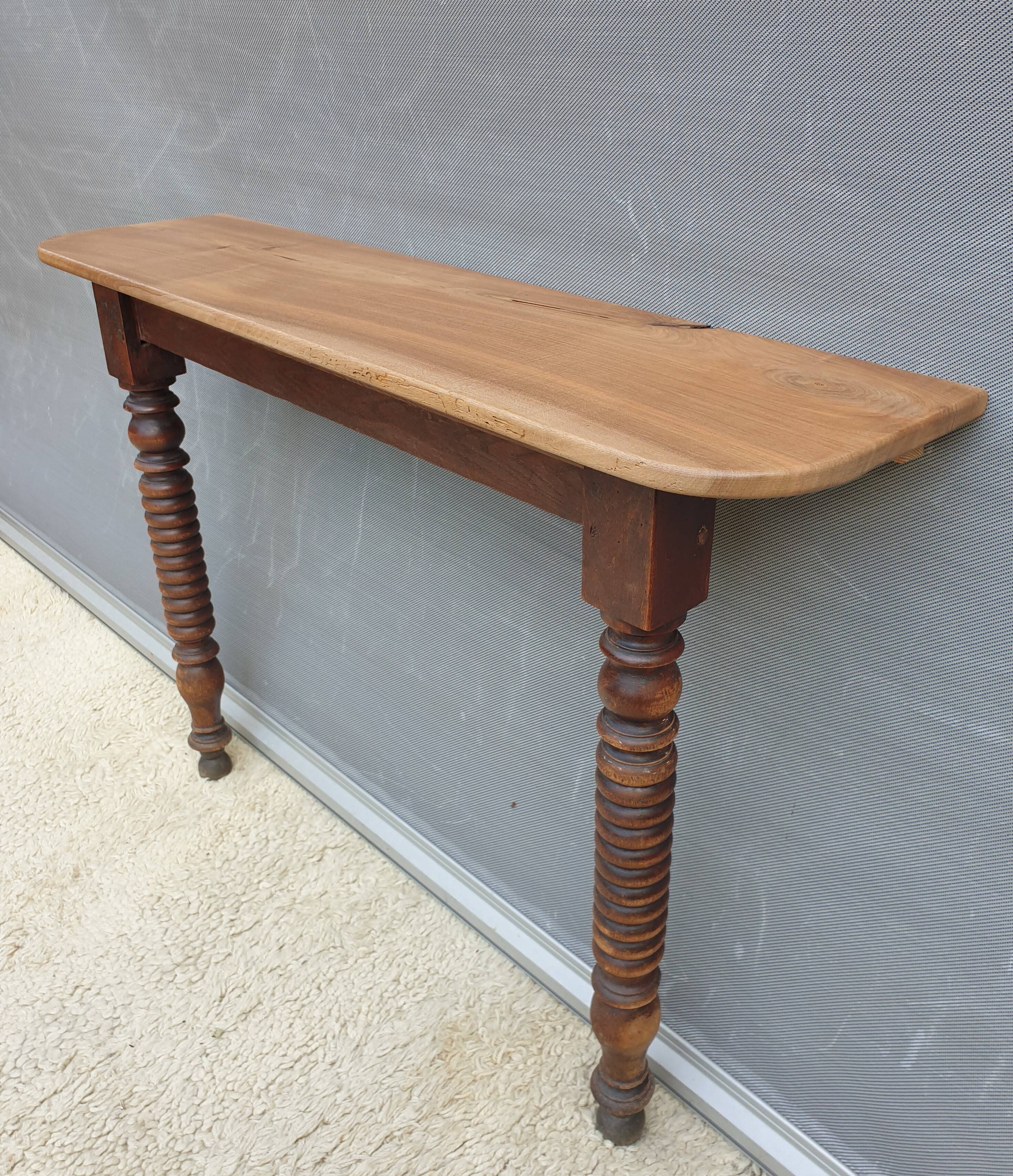 Console xixth walnut feet spinning tops