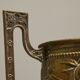 Neoclassical cache-pot in patinated brass, 19th century.