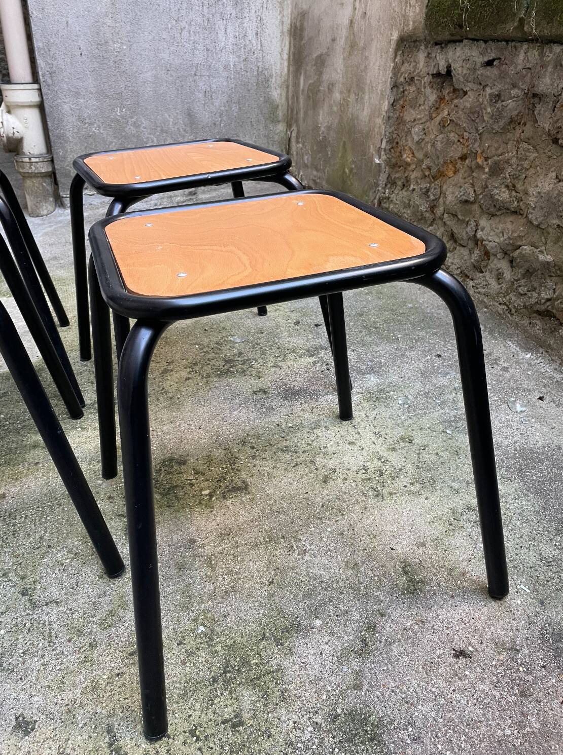 4 black school stools