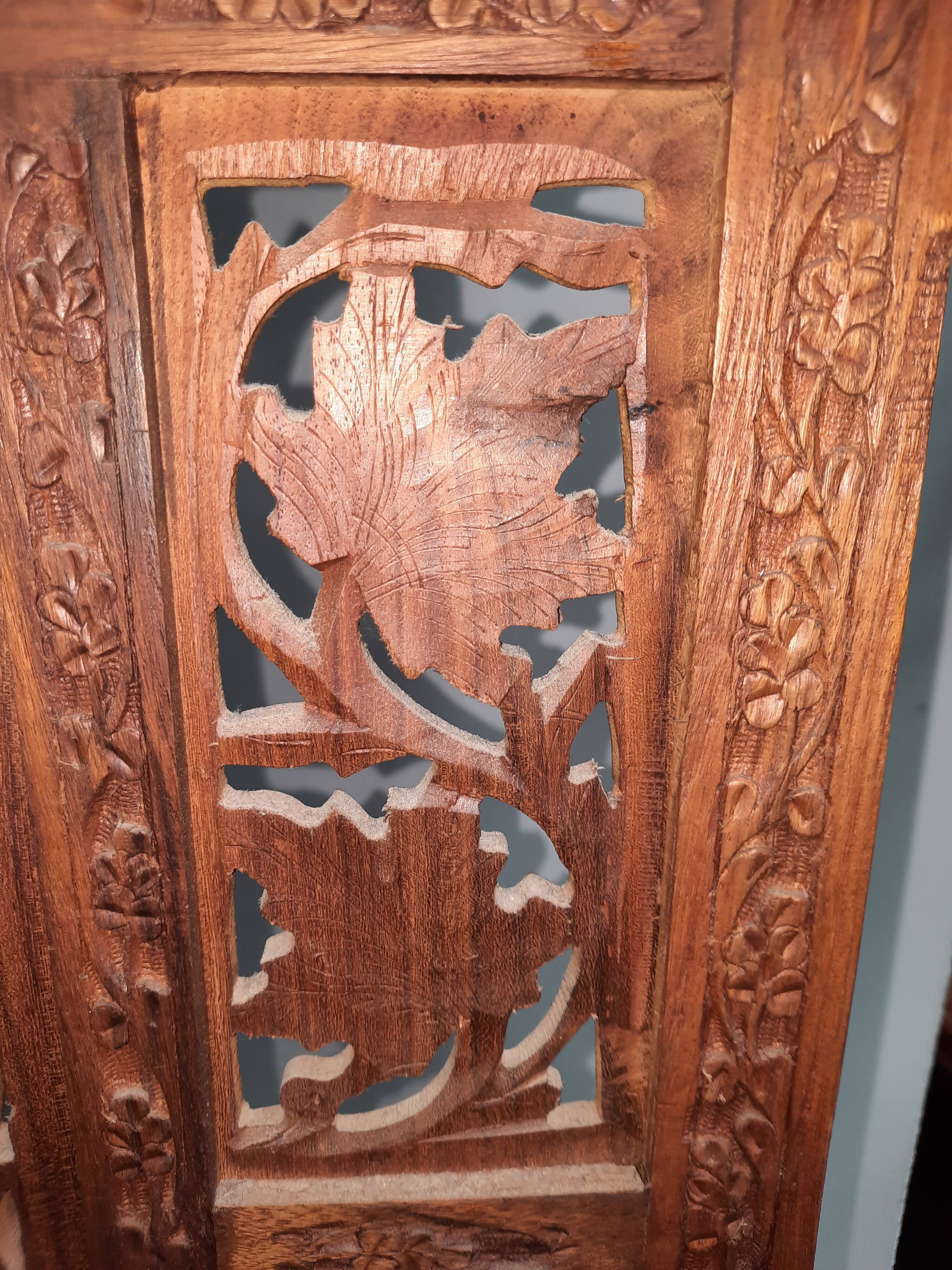 Asian screen in cut-out wood