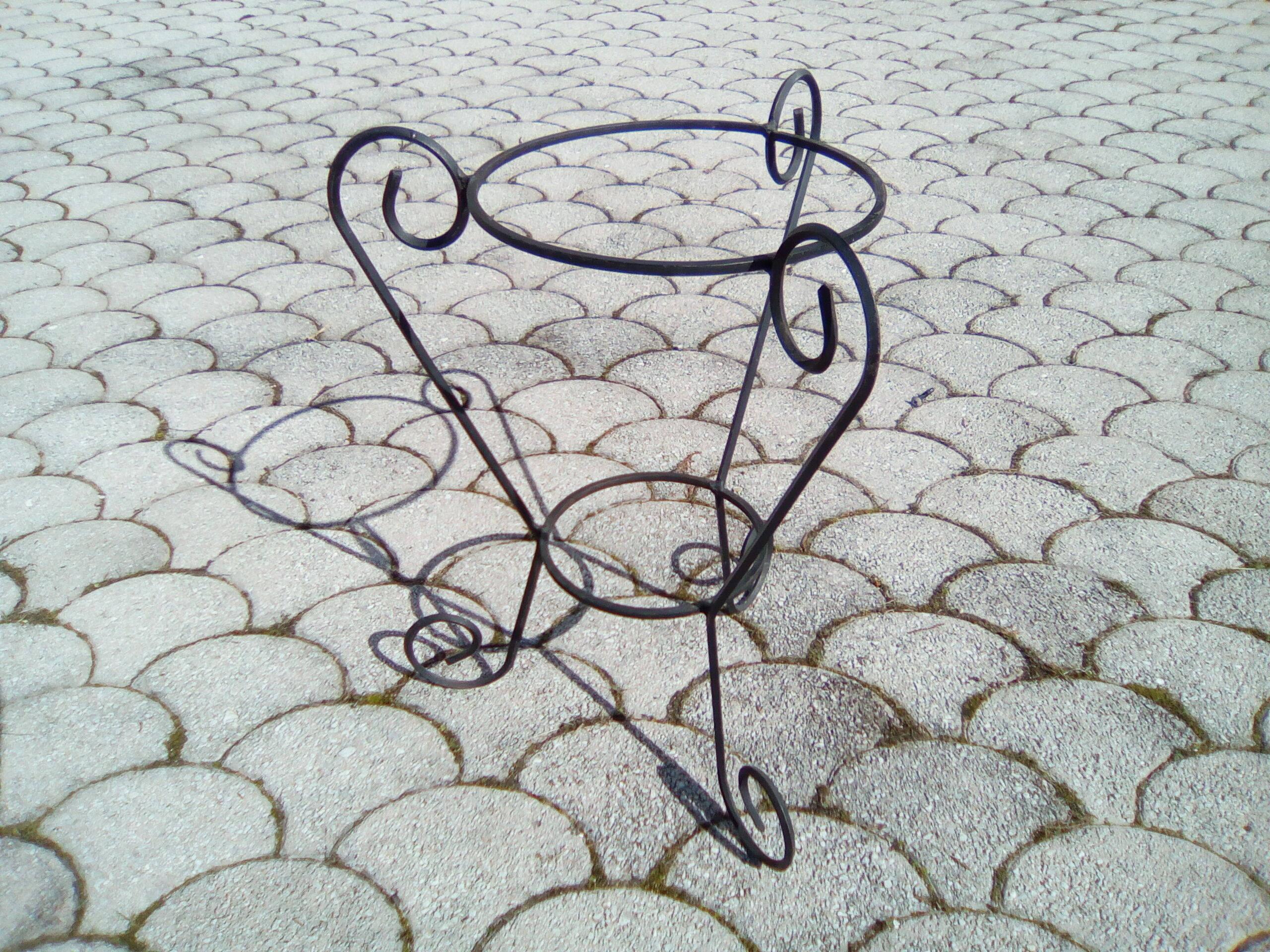 Wrought iron flower pot support