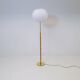 Mid-century floor lamp in brass and oak by Falkenbergs Belysning, Sweden, 1960s.