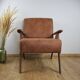 Fauteuil vintage en simili cuir marron