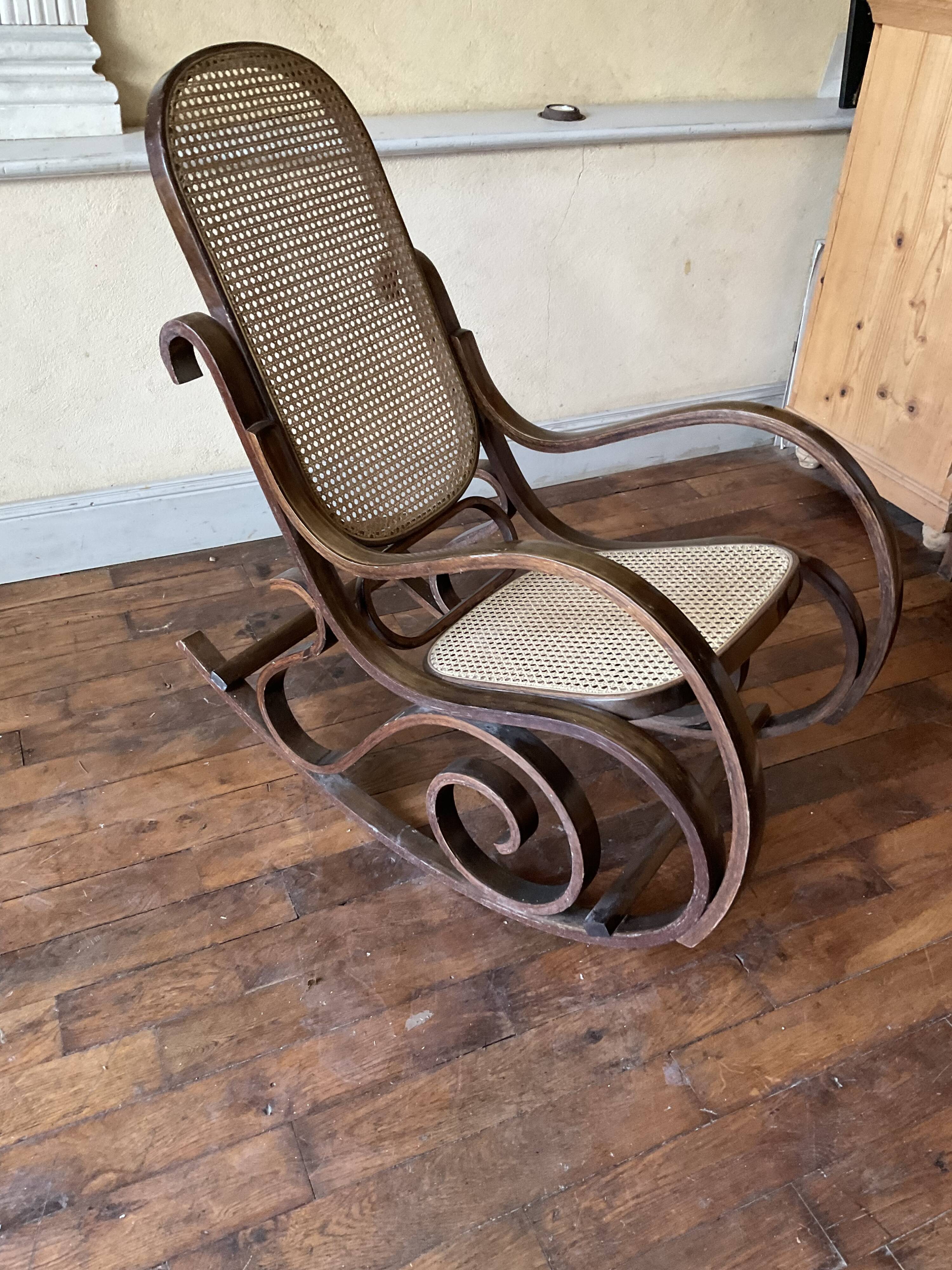 Vintage rocking chair in curved wood