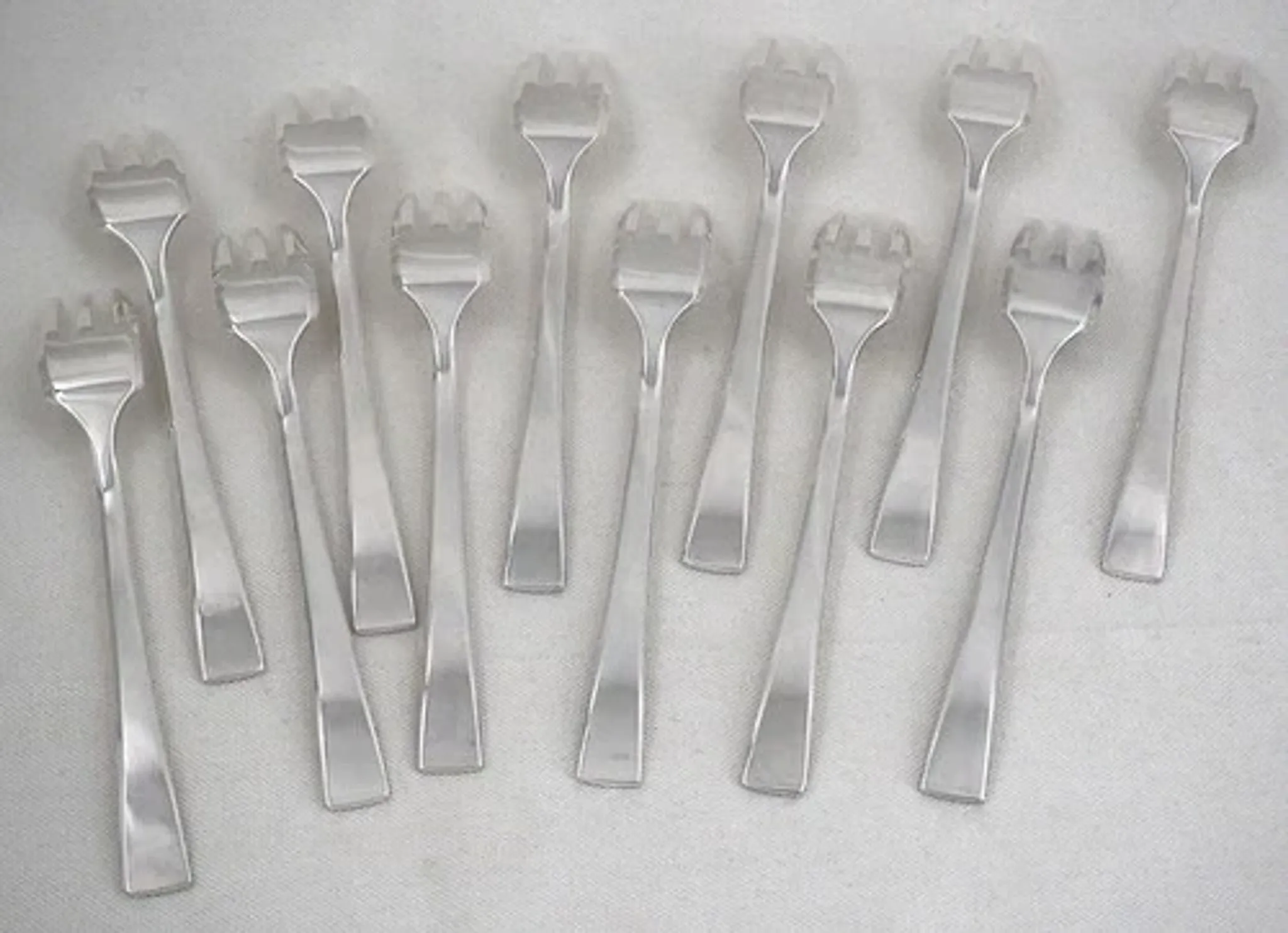 Christofle Concorde Art Deco, 12 silver-plated cake forks, perfect condition.