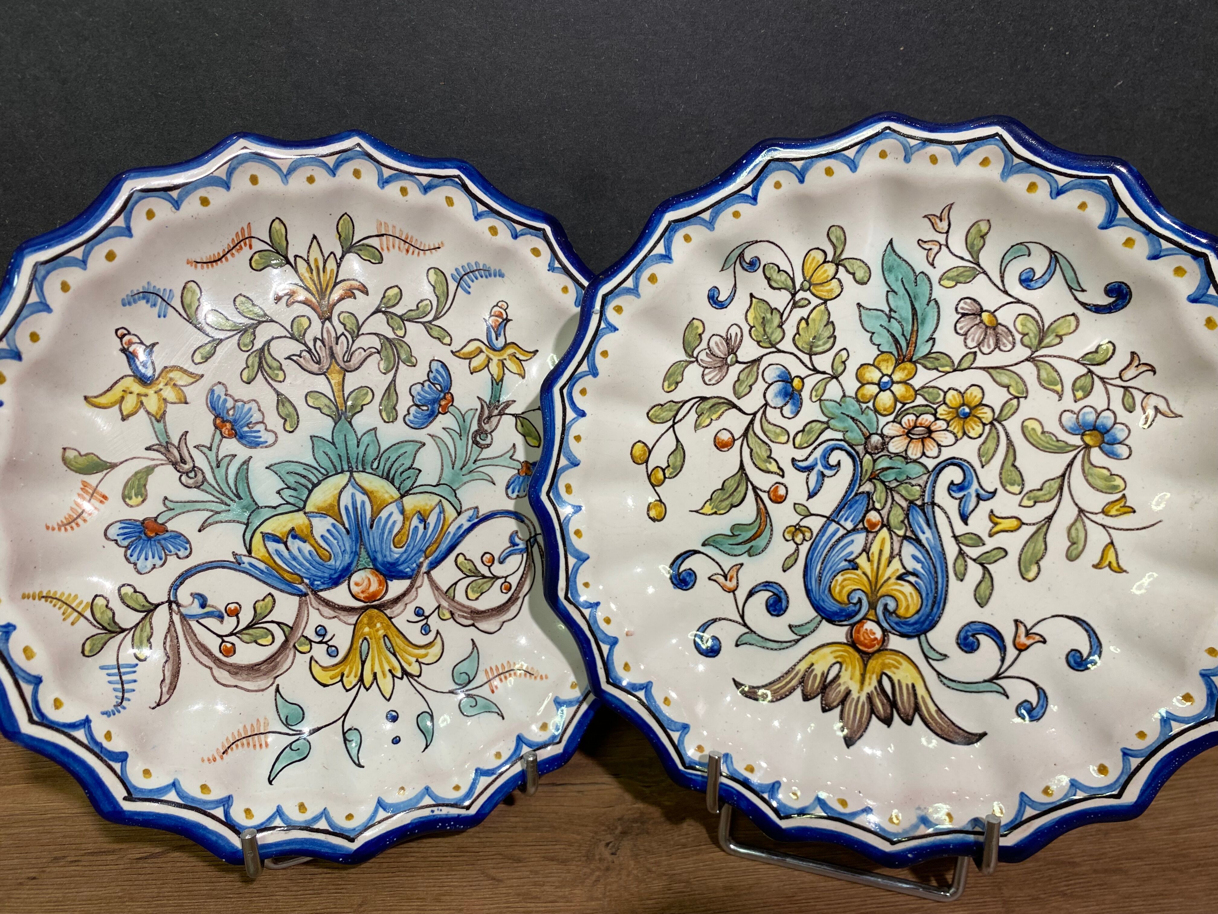 Pair of plates with floral decoration in Nevers earthenware signed Montagnon