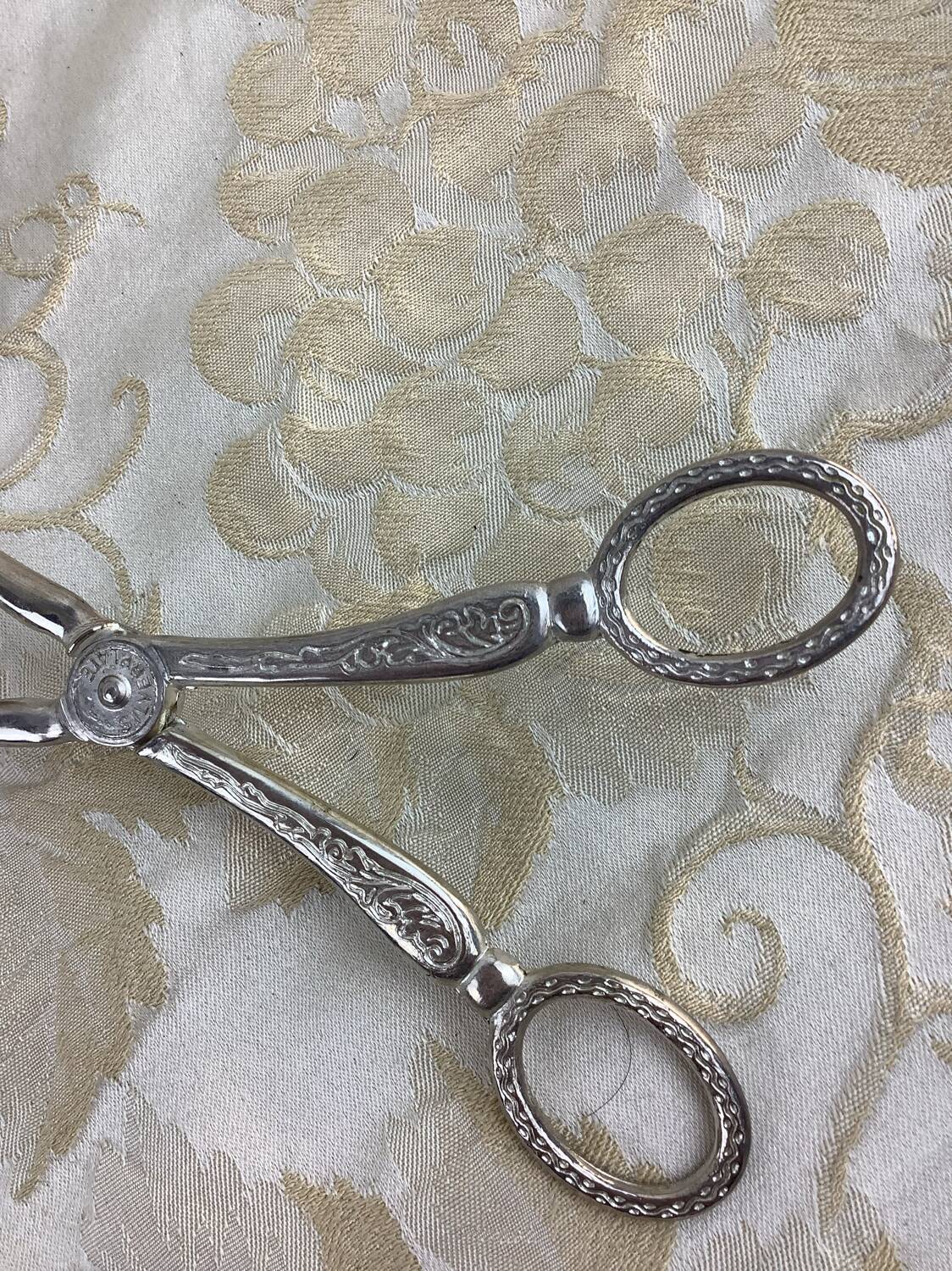 Old cutlery tongs