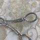 Old cutlery tongs