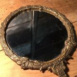 Antique mirror facing round hand in bronze 23cm