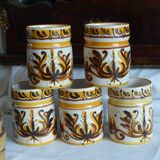 5 ceramic spice jars.