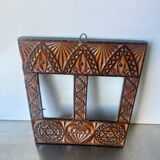 Double frame intricately carved wood