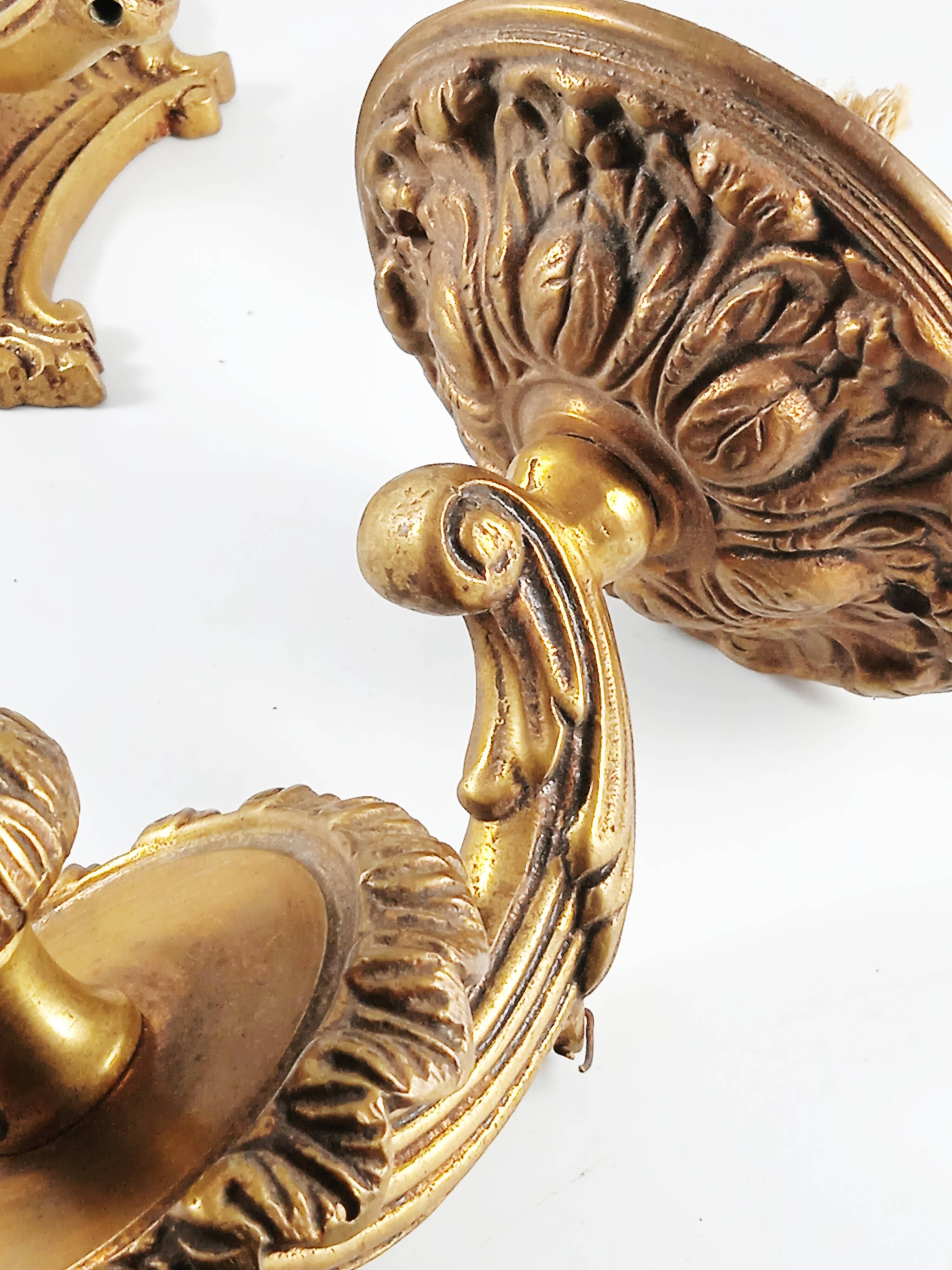 Set of 2 old candlestick sconces in bronze