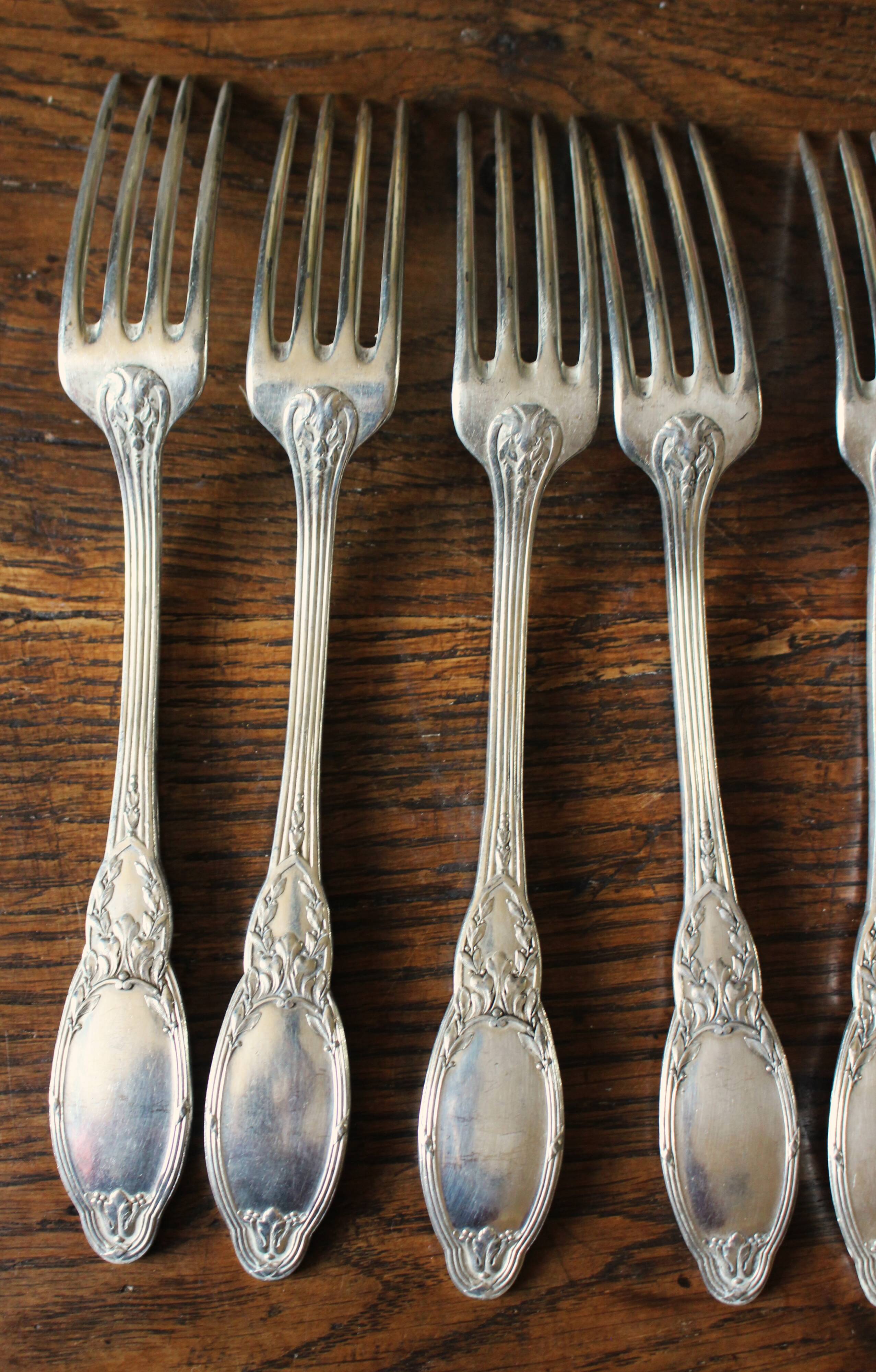 A set of 6 silver-plated foliage forks