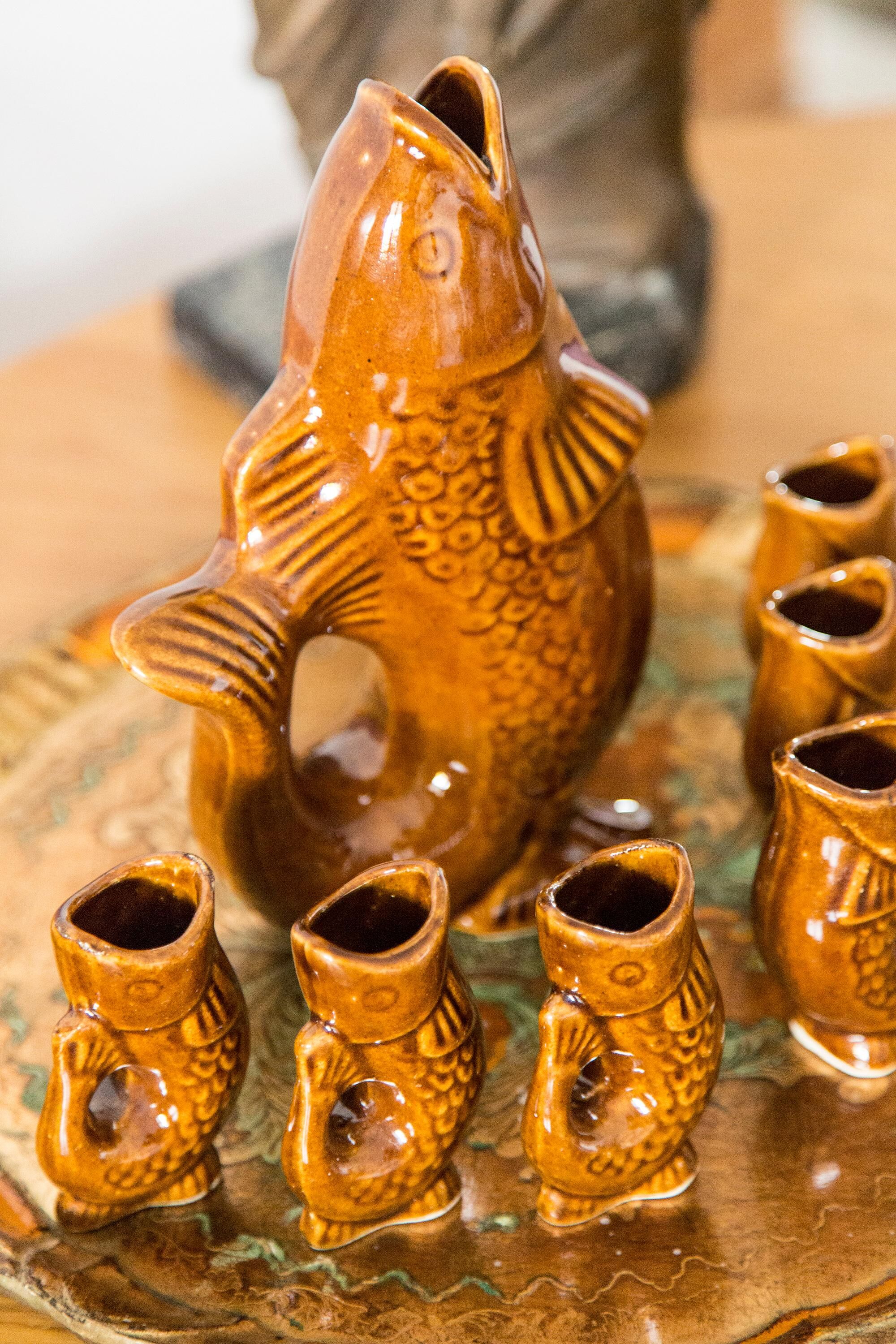 Brown glass and porcelain fish service, mid-20th century, Europe, 1960s