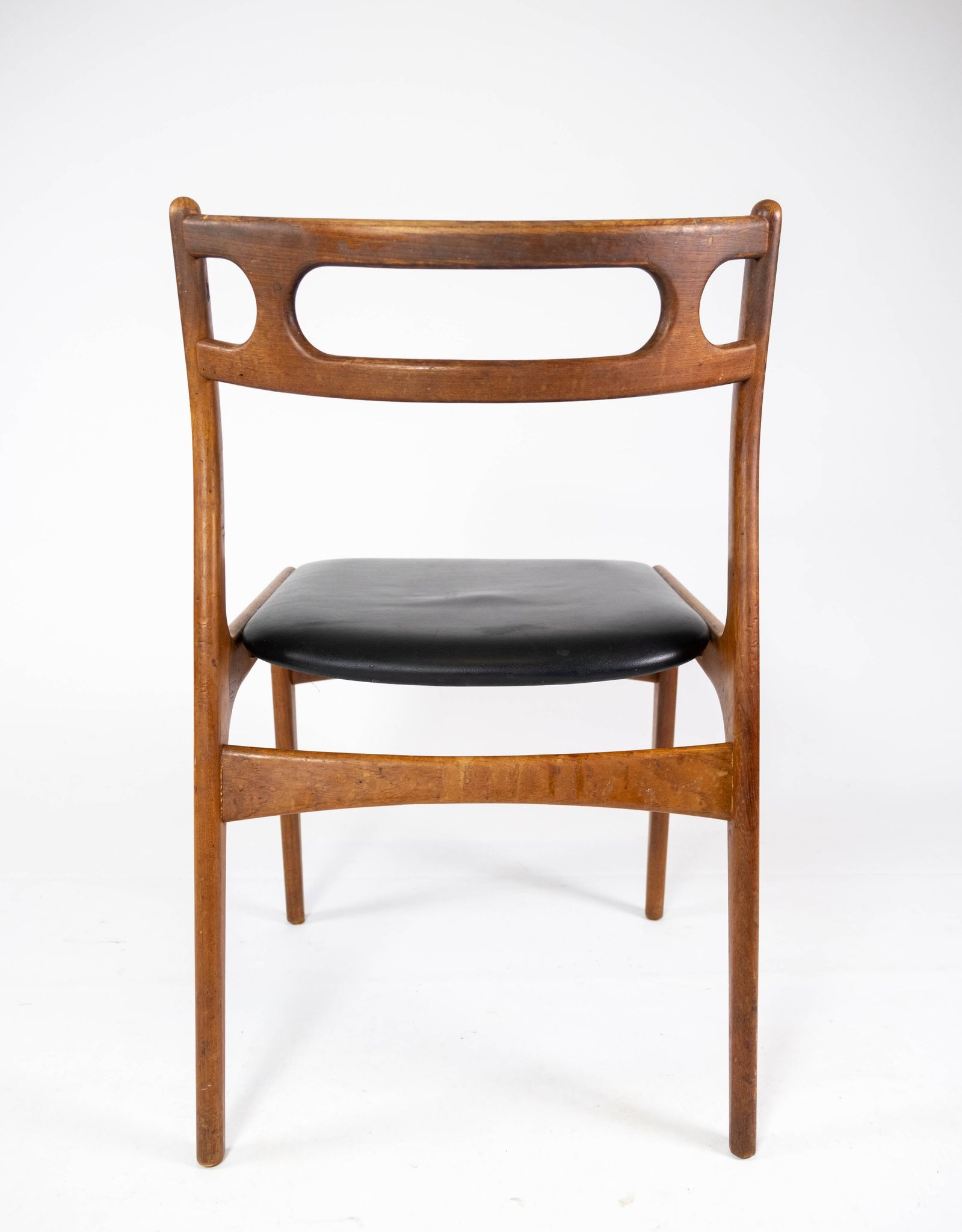 A set of four dining room chairs of teak of danish design, 1960s