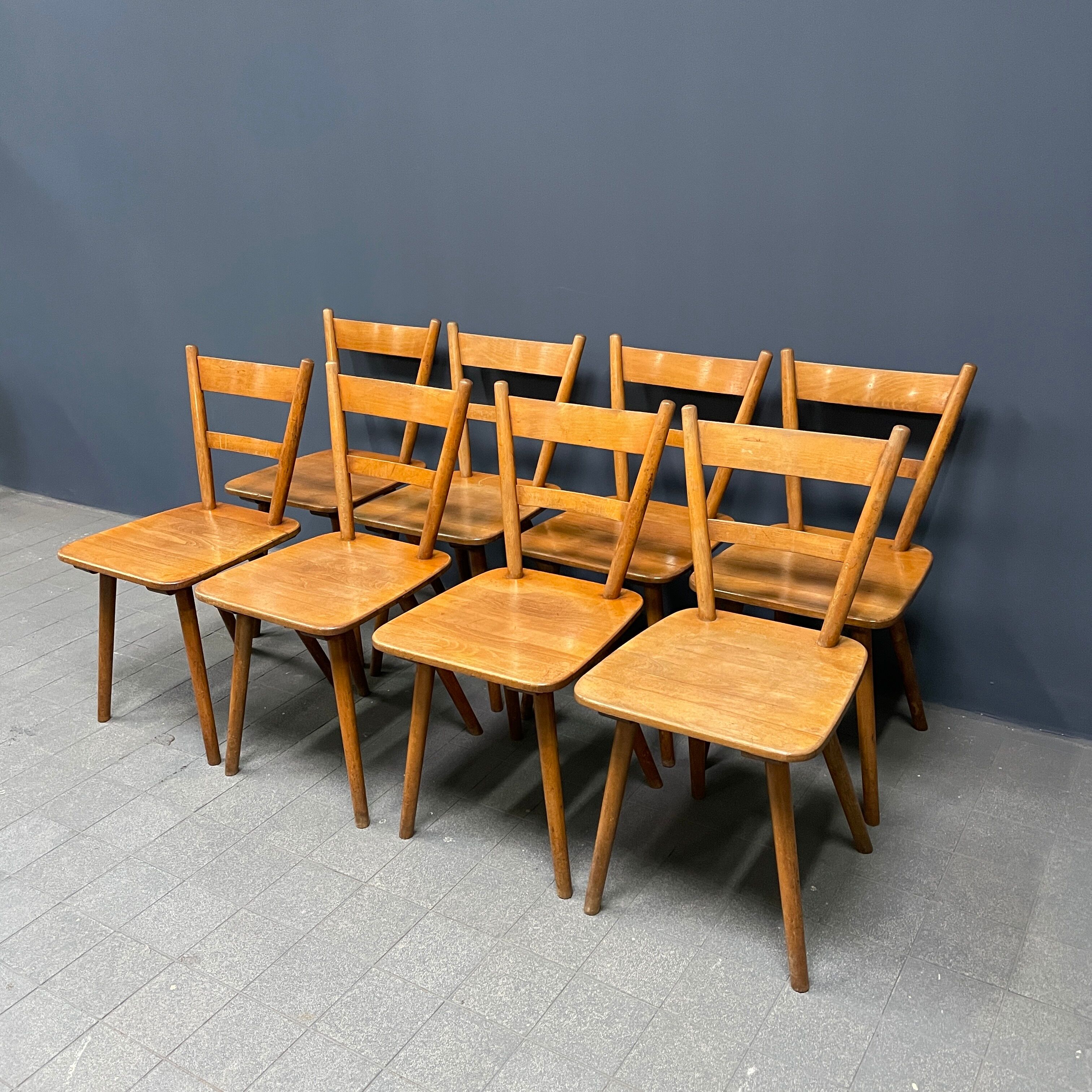 Set of eight german stick chairs from the 1950