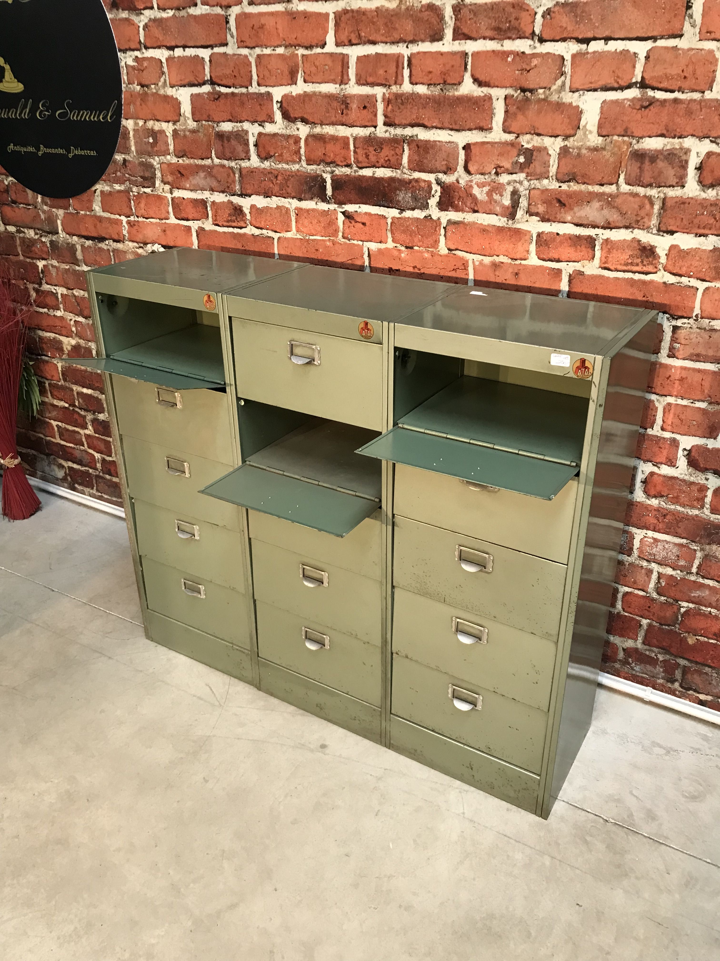 Vintage industrial furniture with metal clamshell atal