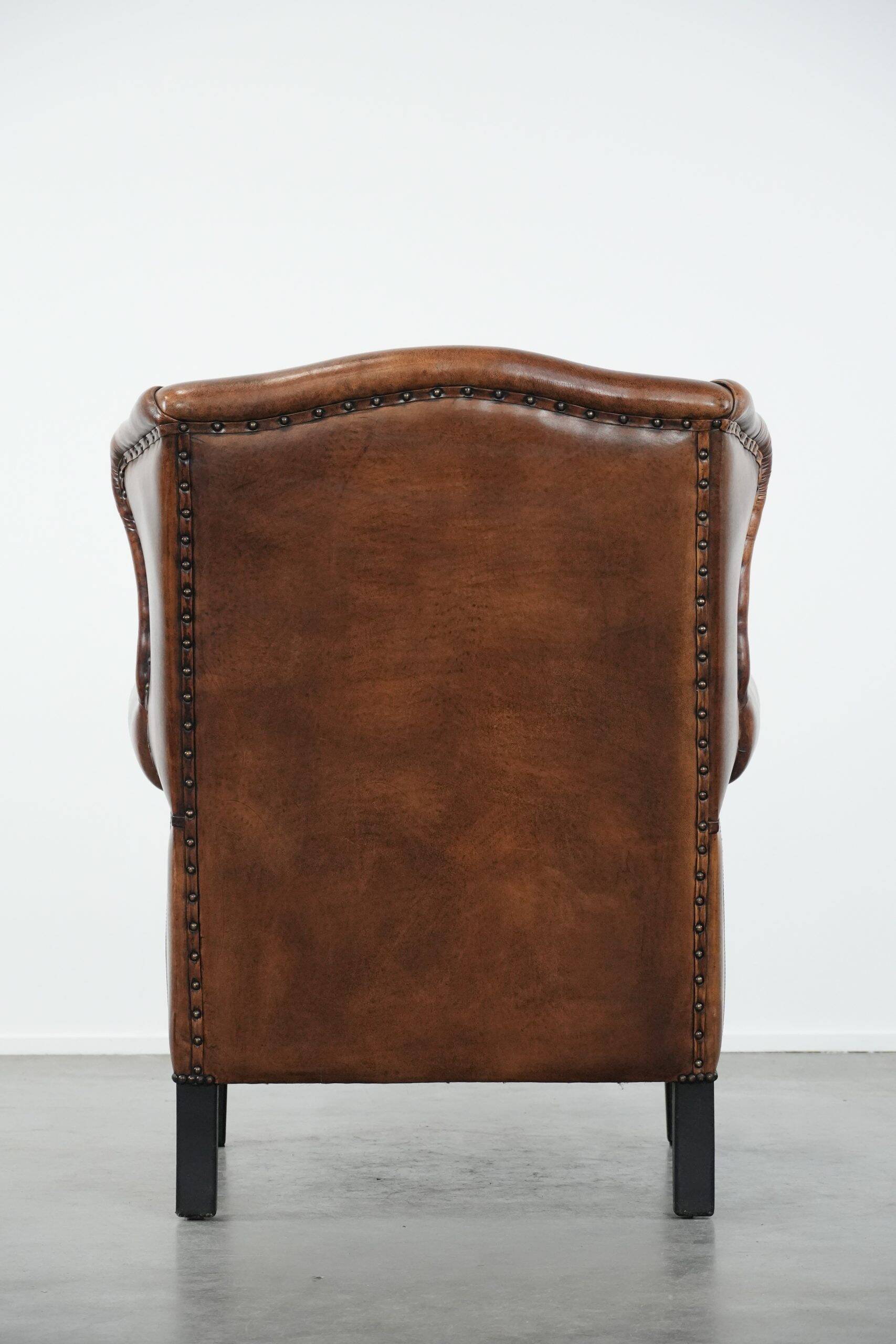 Timeless sheepskin wingback armchair with beautiful colours
