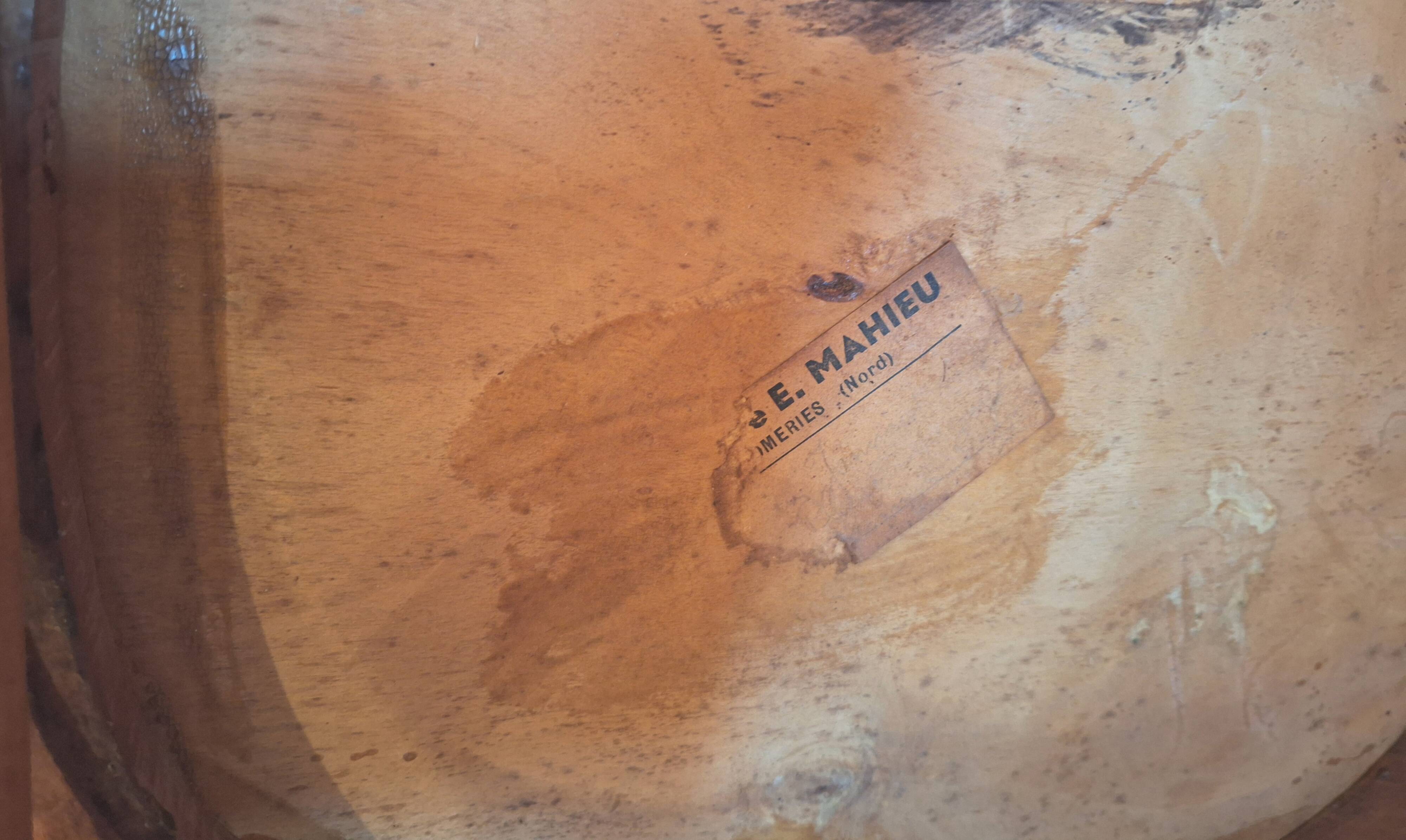 Curved wooden armchair