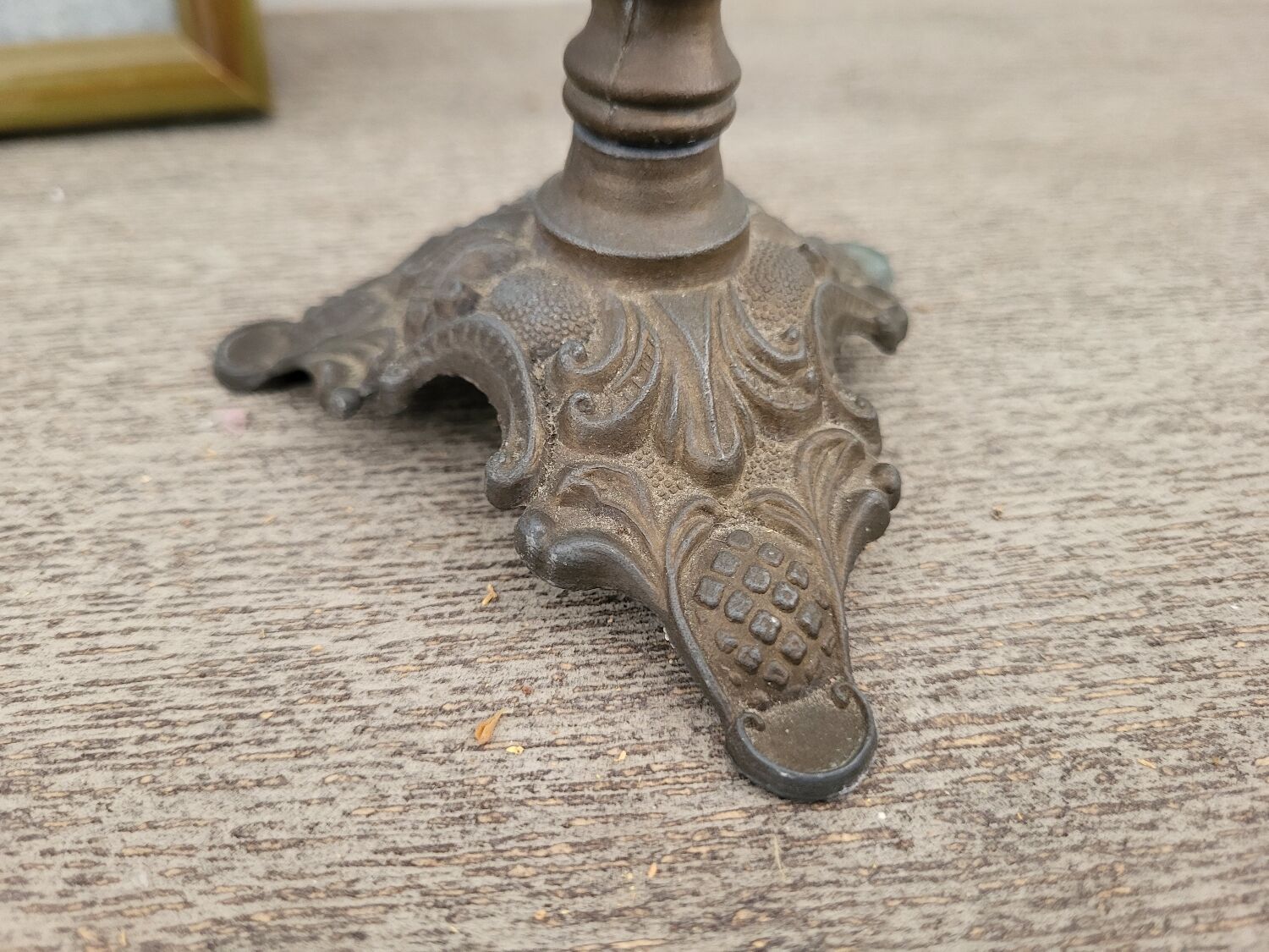 Pewter gray cherub candle holder.