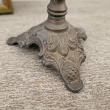 Pewter gray cherub candle holder.