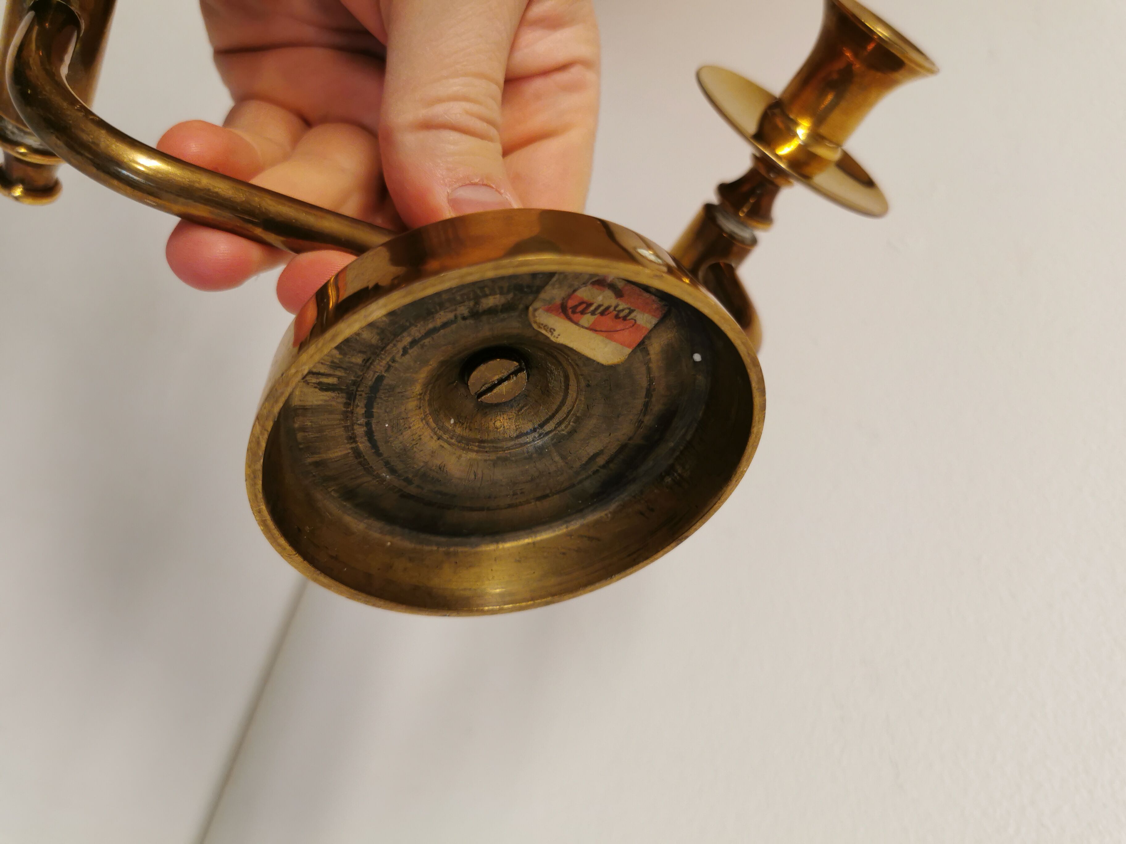 Classic Danish wall hung design candlestick in solid brass