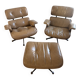 Armchairs and footrests by Charles & Ray Eames