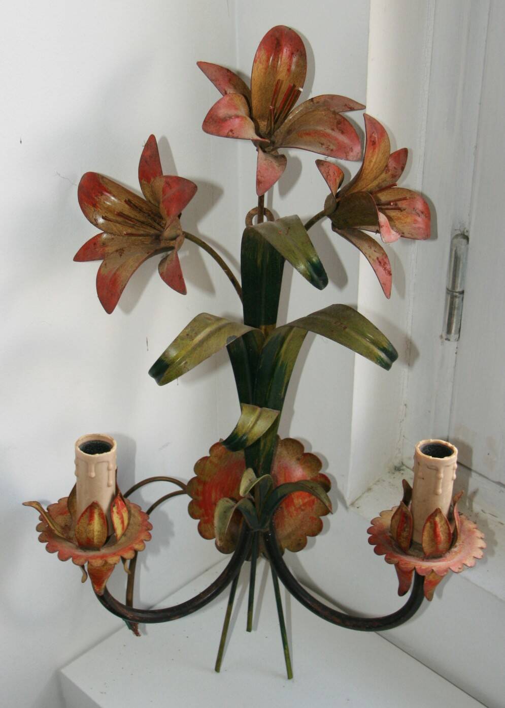 Pair of vintage floral wall sconces in Italian Florentine style metal.