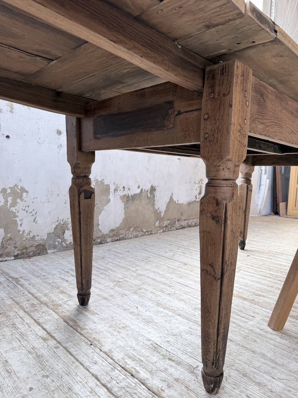 Solid oak farmhouse table with integrated extensions 1950