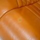 Sofa "space age". Leather, fiberglass, foam, steel. Circa 1970. Orange.