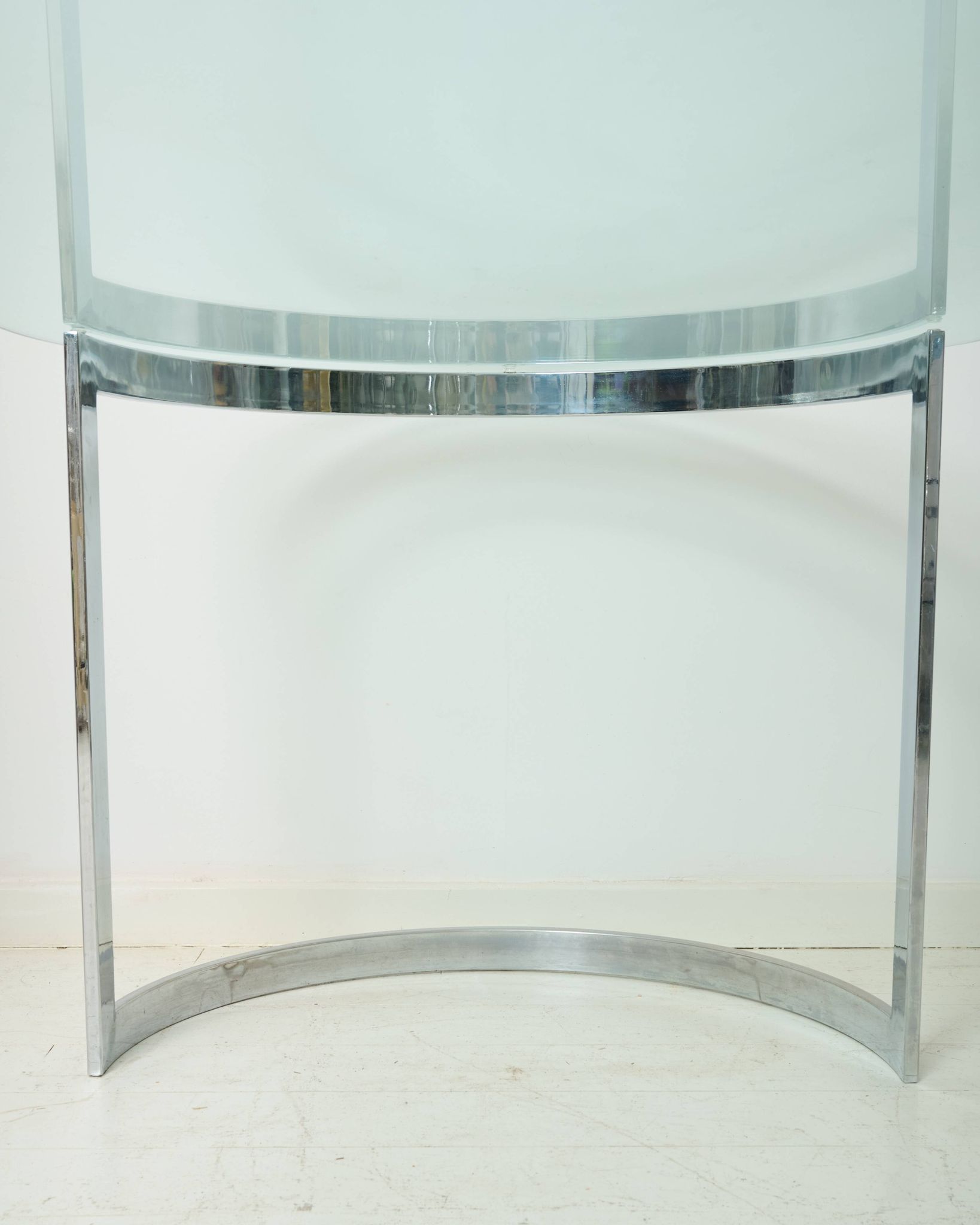 Dining table with a circular base.