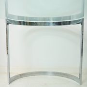 Dining table with a circular base.