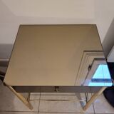 Golden bedside table with mirrored top