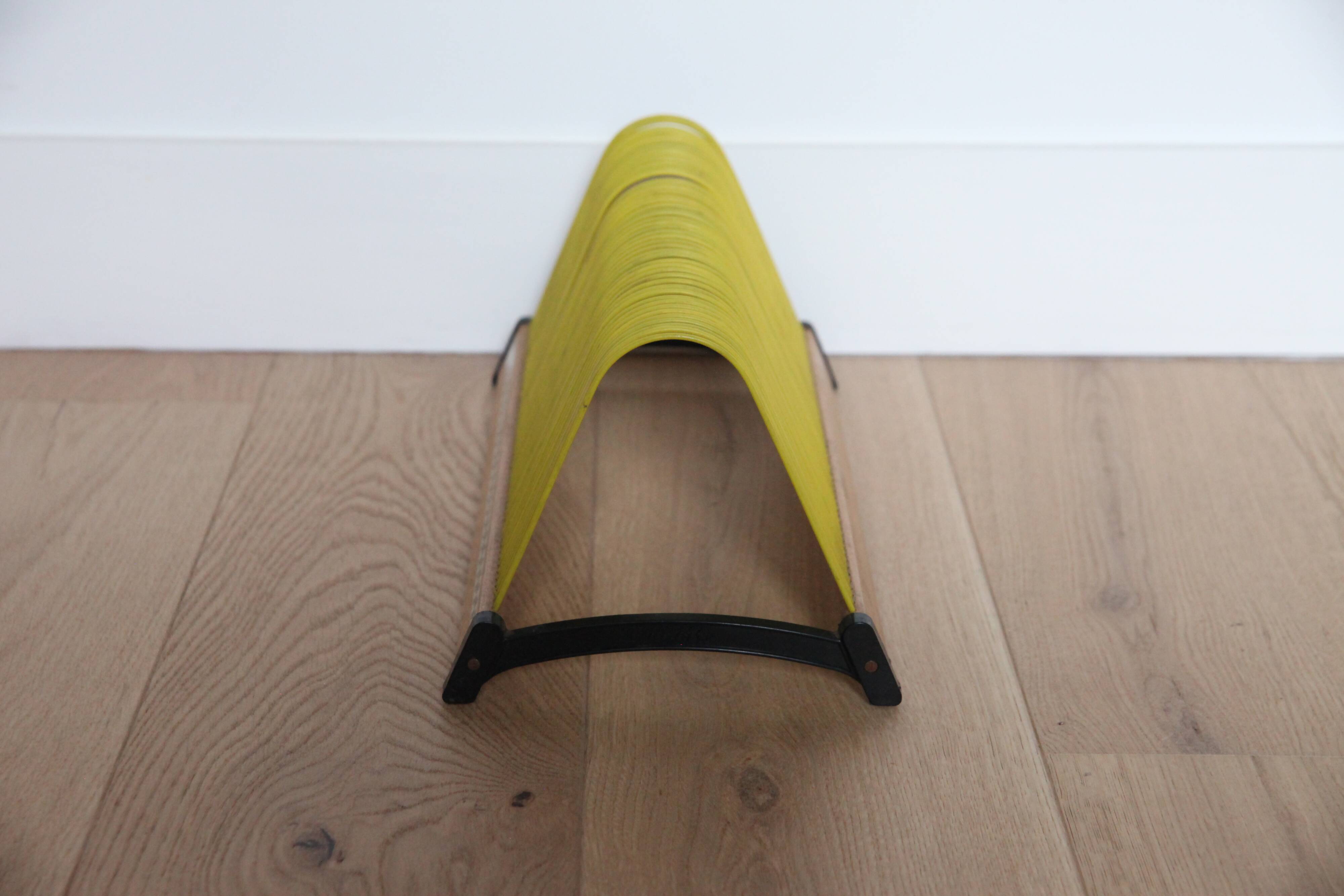 Yellow vinyl door, wooden structure