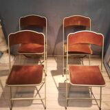 Set of four folding metal and velvet chairs