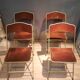 Set of four folding metal and velvet chairs